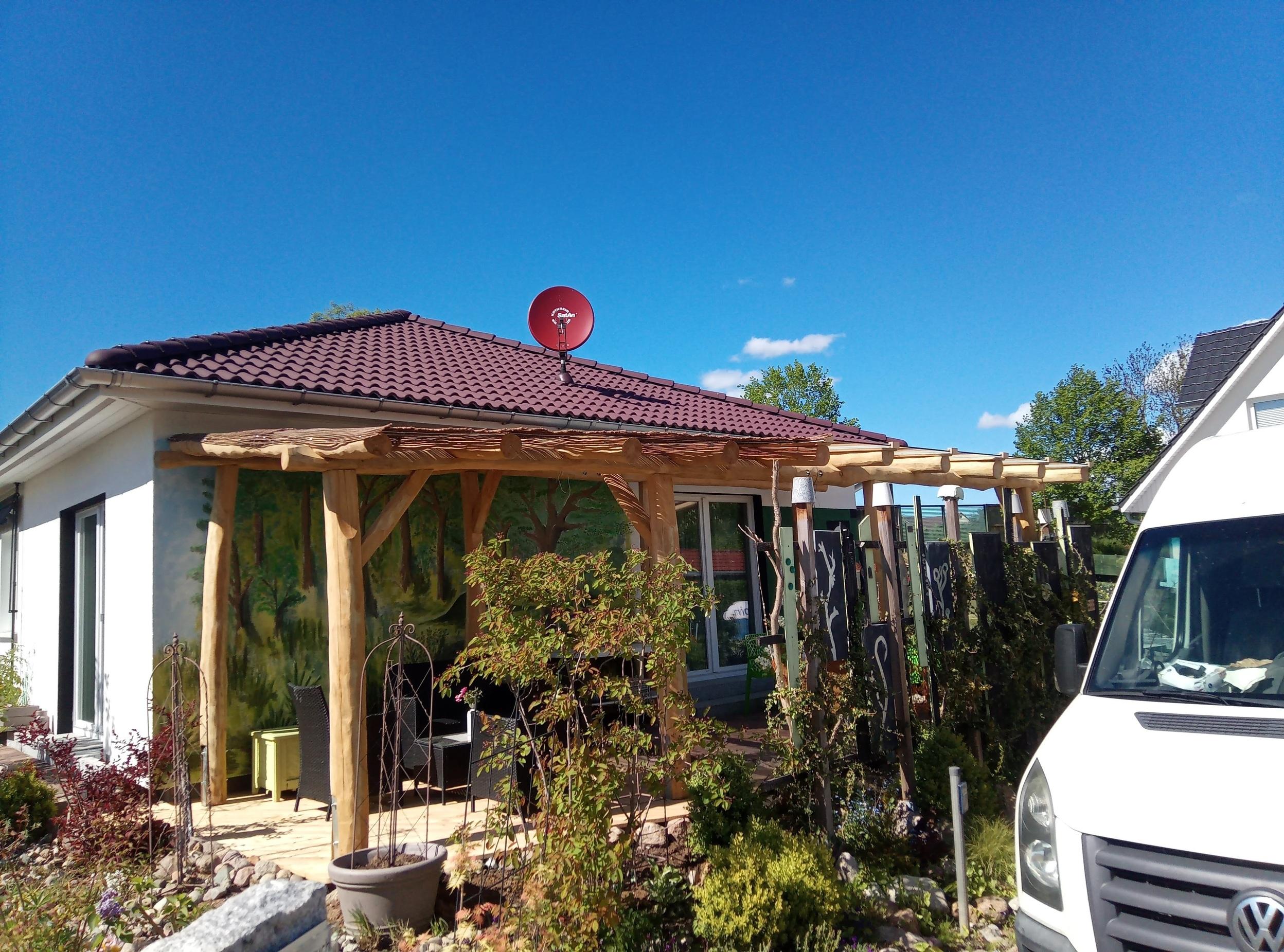 Außenansicht Terrassenüberdachung mit Holz